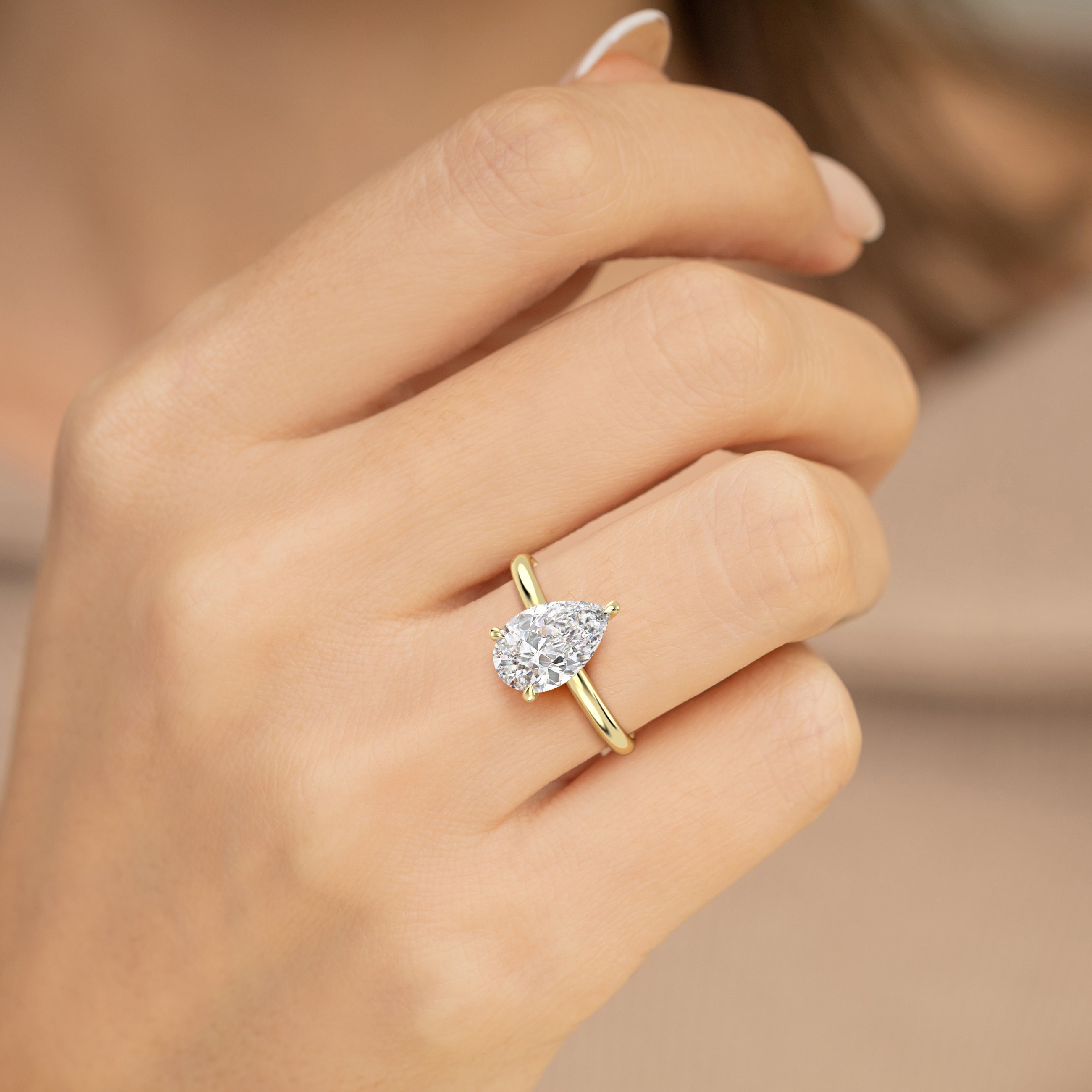 The Celeste Ring - Pear Solitaire with Hidden Halo