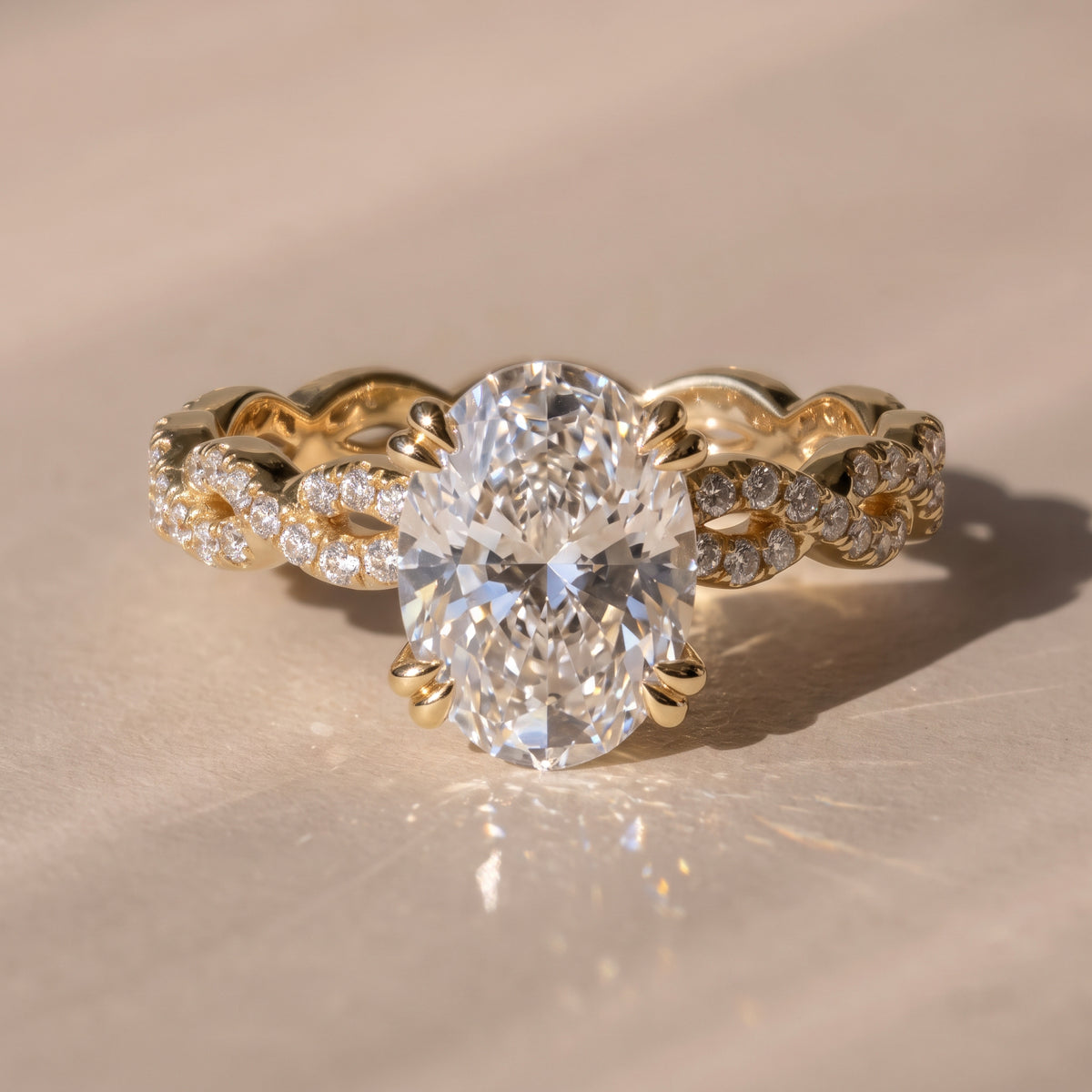The Elysande Ring — Oval Solitaire with Braided Pavé Band Lab-Grown Diamond Engagement Ring in Yellow Gold | The Jewel Concierge