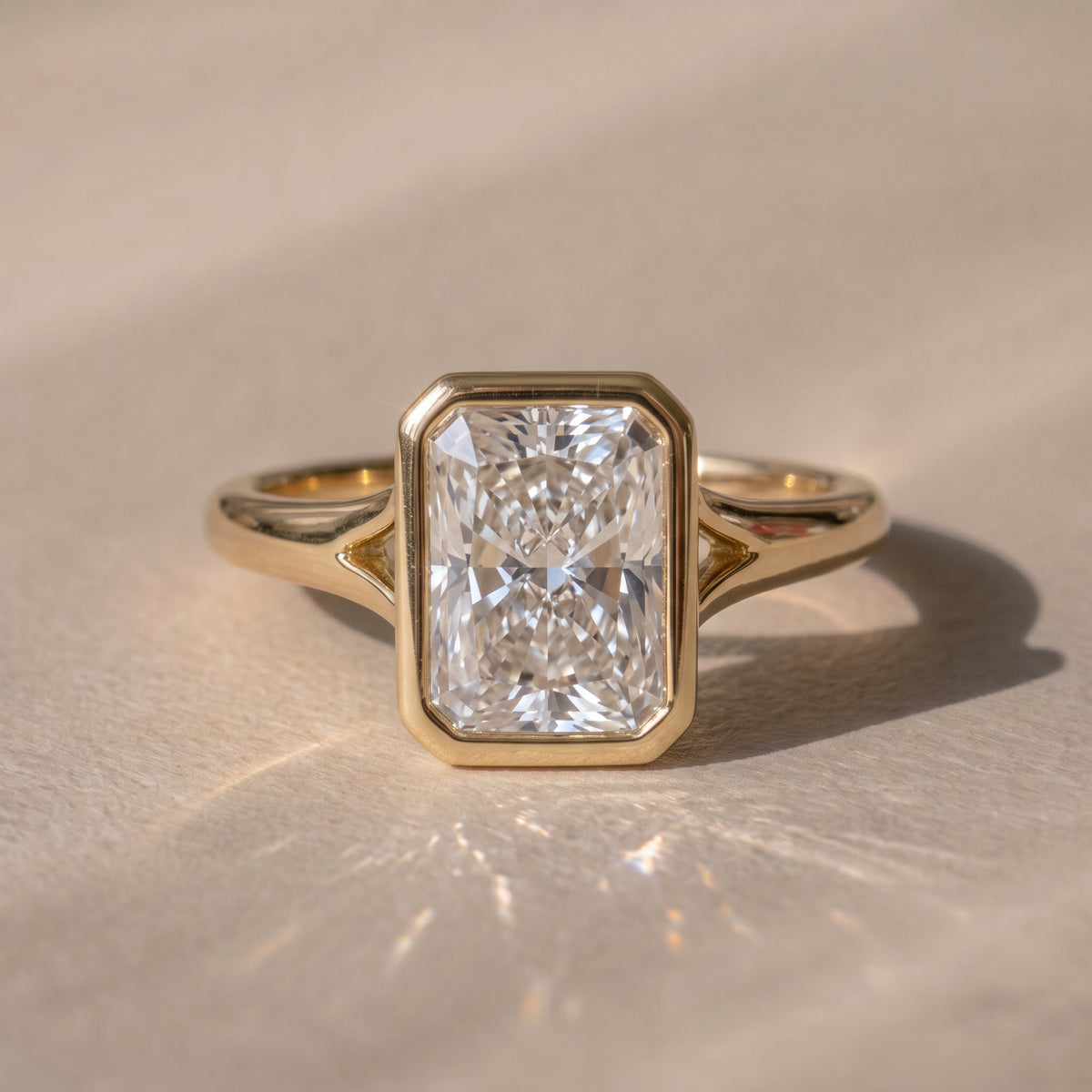 The Gabriella Ring — Radiant Bezel with Split Band Lab-Grown Diamond Engagement Ring in Yellow Gold | The Jewel Concierge
