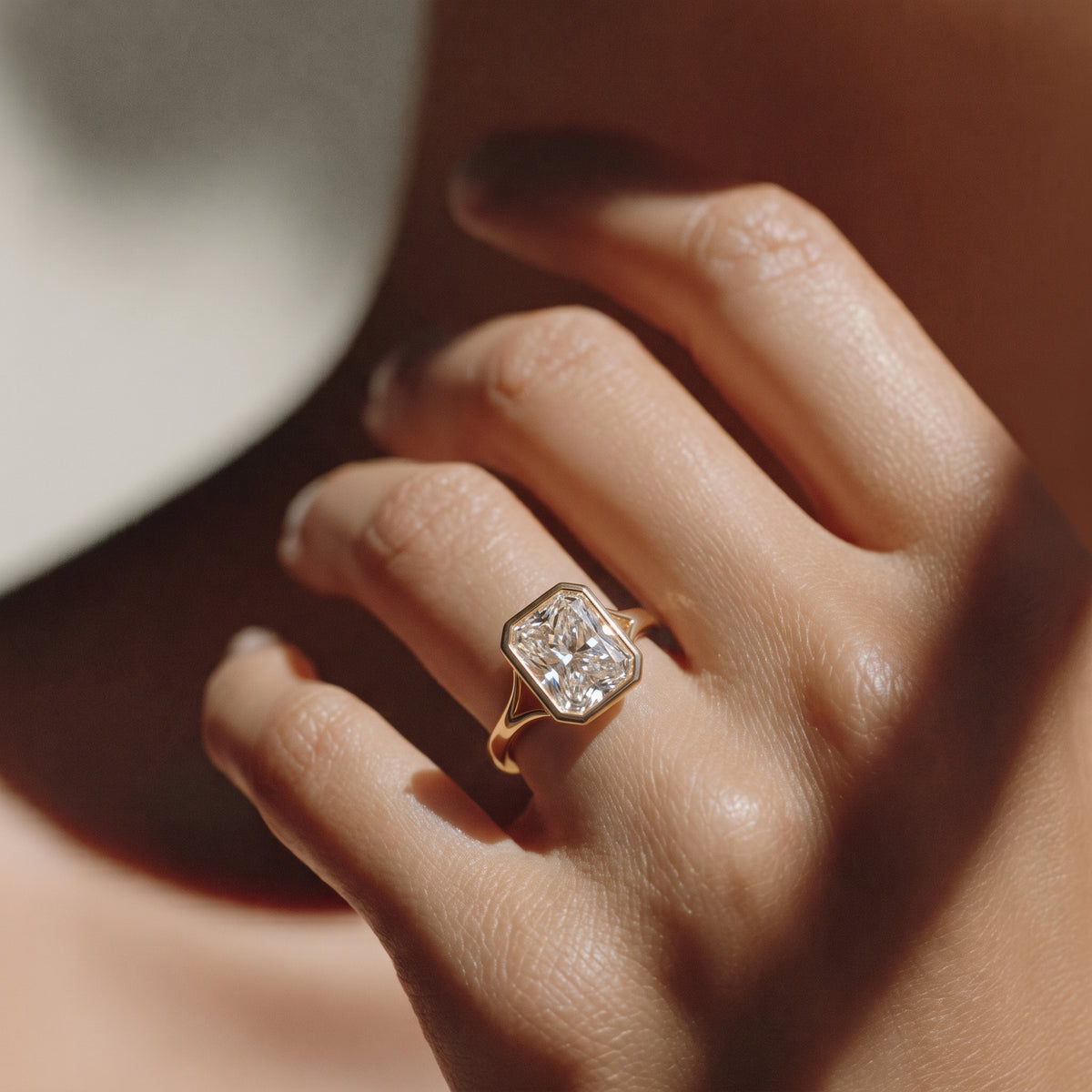 The Gabriella Ring — Radiant Bezel with Split Band Lab-Grown Diamond Engagement Ring in Yellow Gold | The Jewel Concierge