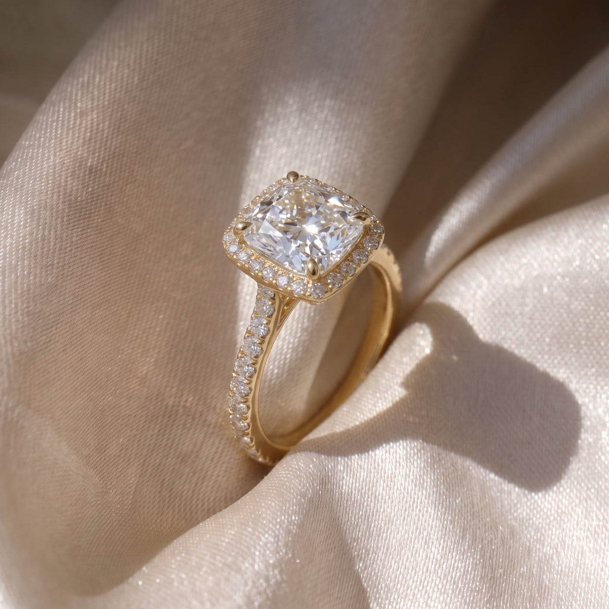 The Gemma Ring — Cushion Orbital Halo Cathedral with Pavé Band Lab-Grown Diamond Engagement Ring in Yellow Gold | The Jewel Concierge