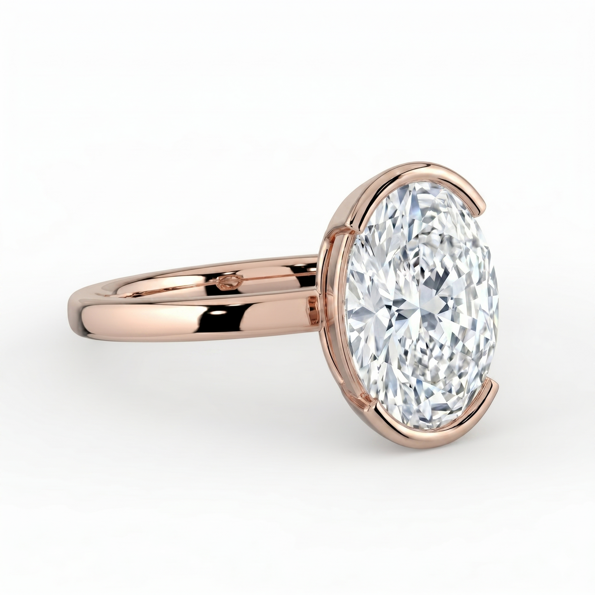 The Celine Ring — Oval Half Bezel Solitaire Lab-Grown Diamond Engagement Ring in Rose Gold | The Jewel Concierge