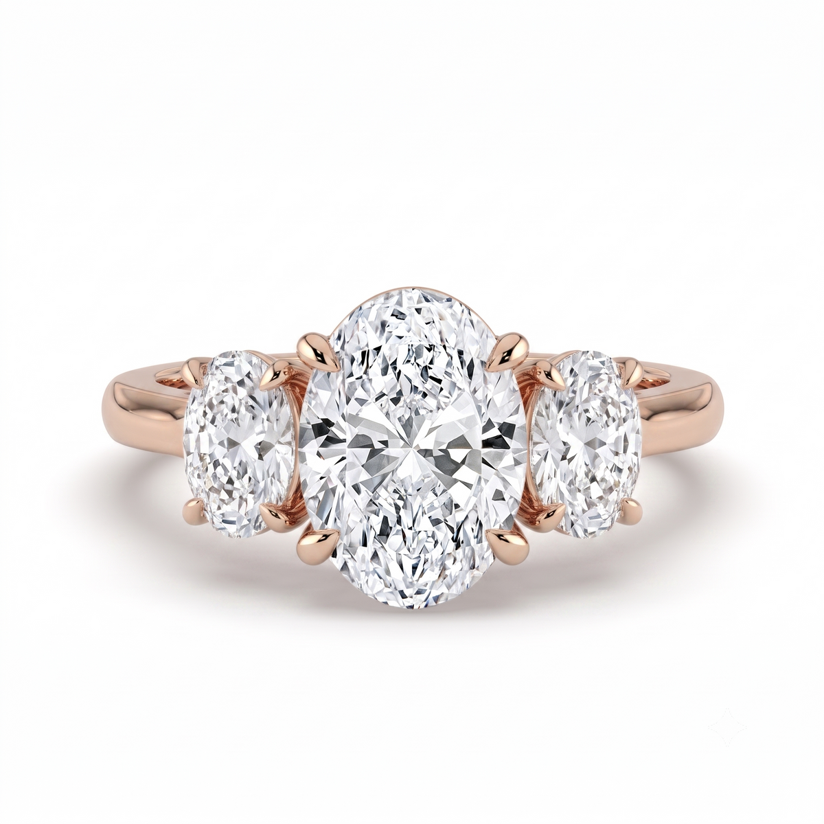 The Charlotte Ring - Oval trilogy with a rose gold band | The Jewel Concierge