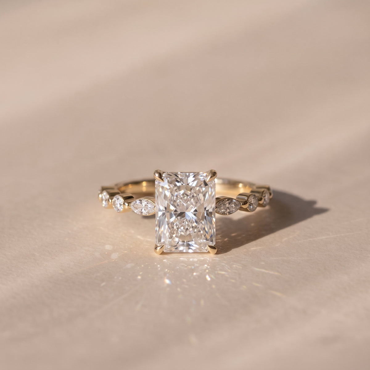 The Vega Ring — Radiant with Marquise & Round Accents Lab-Grown Diamond Engagement Ring in Yellow Gold | The Jewel Concierge