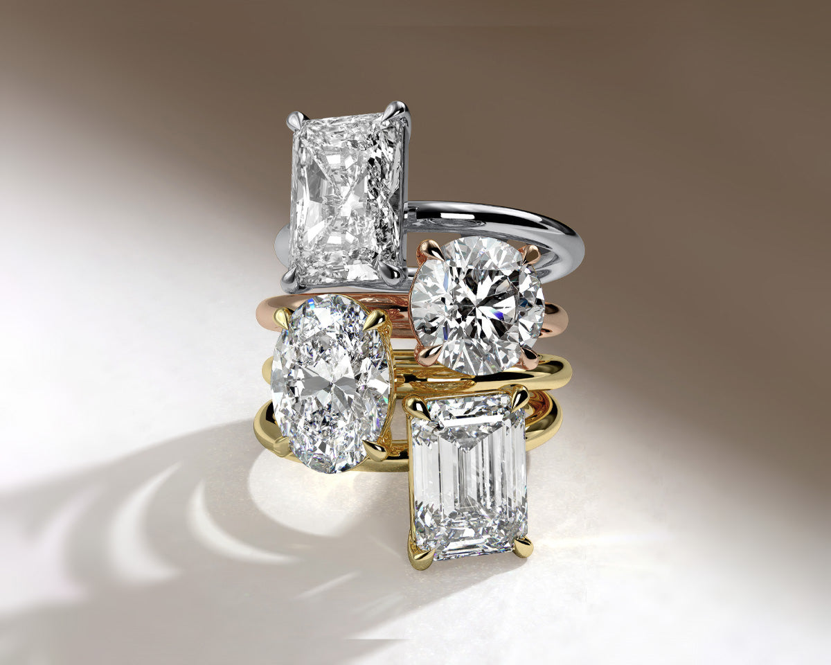 ring stack of beautiful diamond engagement rings in 18K gold