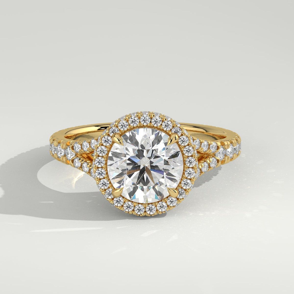 The Gemma Ring, a round brilliant lab-grown diamond engagement ring, on a soft grey background | The Jewel Concierge