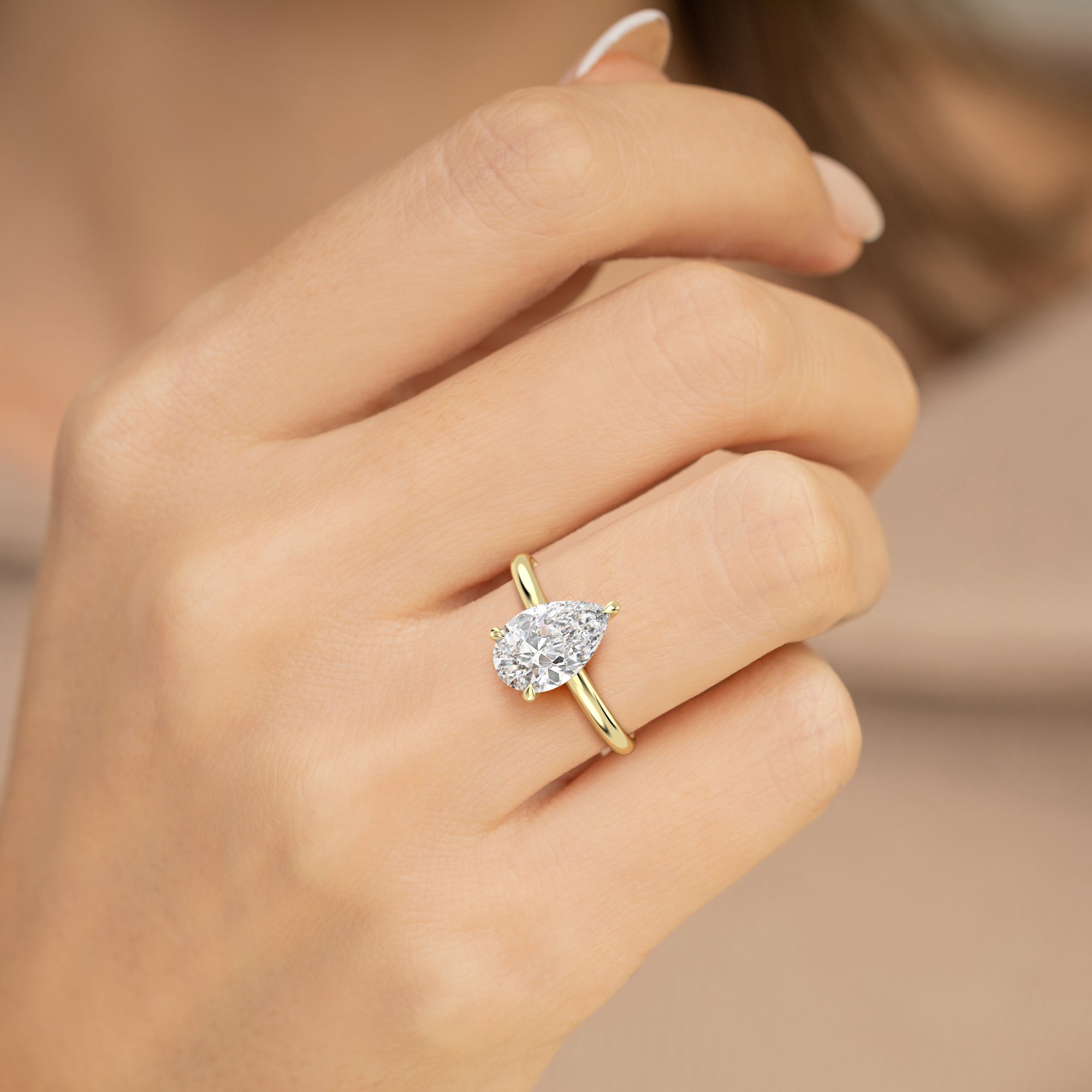 The Celeste Ring - Pear Solitaire with Hidden Halo