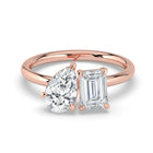 The Eloise Ring — Pear and Emerald Hidden Halo Toi Et Moi Lab-Grown Diamond Engagement Ring in Rose Gold | The Jewel Concierge