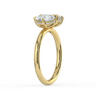 The Eloise Ring — Pear and Emerald Hidden Halo Toi Et Moi Lab-Grown Diamond Engagement Ring in Yellow Gold | The Jewel Concierge