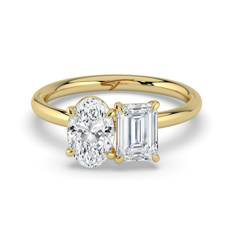 The Luise Ring — Oval and Emerald Toi Et Moi Lab-Grown Diamond Engagement Ring in Yellow Gold | The Jewel Concierge