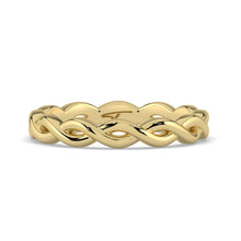 Gold braided ring on a white background