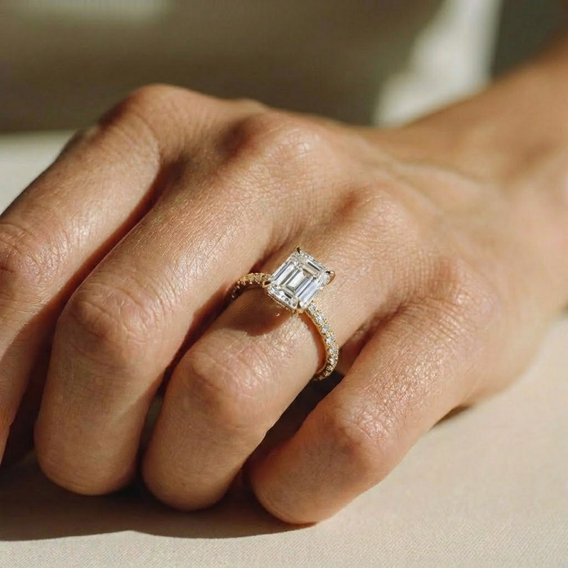 The Astra Ring – Emerald Solitaire with Pavé Band in 14K White Gold – The Jewel Concierge