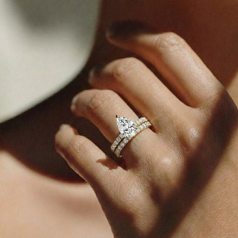 The Astra Ring – Pear Solitaire with Pavé Band in 14K White Gold – The Jewel Concierge