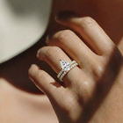 The Astra Ring - Pear Solitaire with Pavé Band