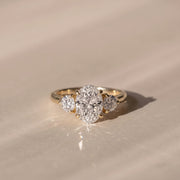 The Annalise Ring — Oval and Round Trilogy Lab-Grown Diamond Engagement Ring in Yellow Gold | The Jewel Concierge