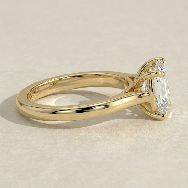 The Aria Ring – East-West Emerald Solitaire in 14K White Gold – The Jewel Concierge