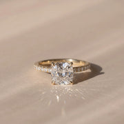 The Astra Ring — Cushion Solitaire with Pavé Band Lab-Grown Diamond Engagement Ring in Yellow Gold | The Jewel Concierge