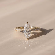 The Astra Ring — Marquise Solitaire with Pavé Band Lab-Grown Diamond Engagement Ring in Yellow Gold | The Jewel Concierge