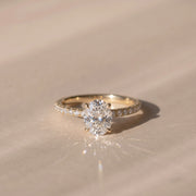 The Astra Ring — Oval Solitaire with Pavé Band Lab-Grown Diamond Engagement Ring in Yellow Gold | The Jewel Concierge