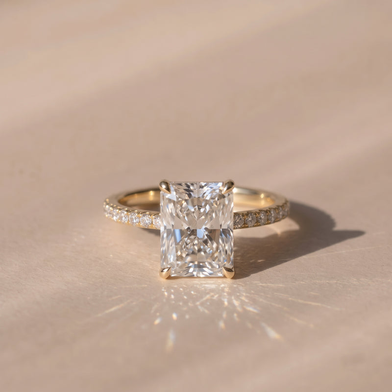The Astra Ring — Radiant Solitaire with Pavé Band Lab-Grown Diamond Engagement Ring in Yellow Gold | The Jewel Concierge