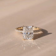 The Astra Ring — Radiant Solitaire with Pavé Band Lab-Grown Diamond Engagement Ring in Yellow Gold | The Jewel Concierge
