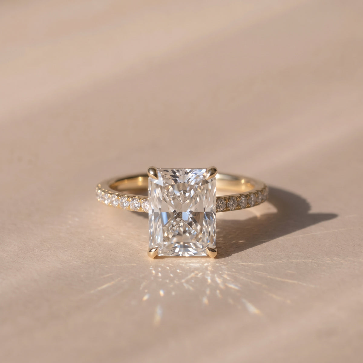The Astra Ring — Radiant Solitaire with Pavé Band Lab-Grown Diamond Engagement Ring in Yellow Gold | The Jewel Concierge