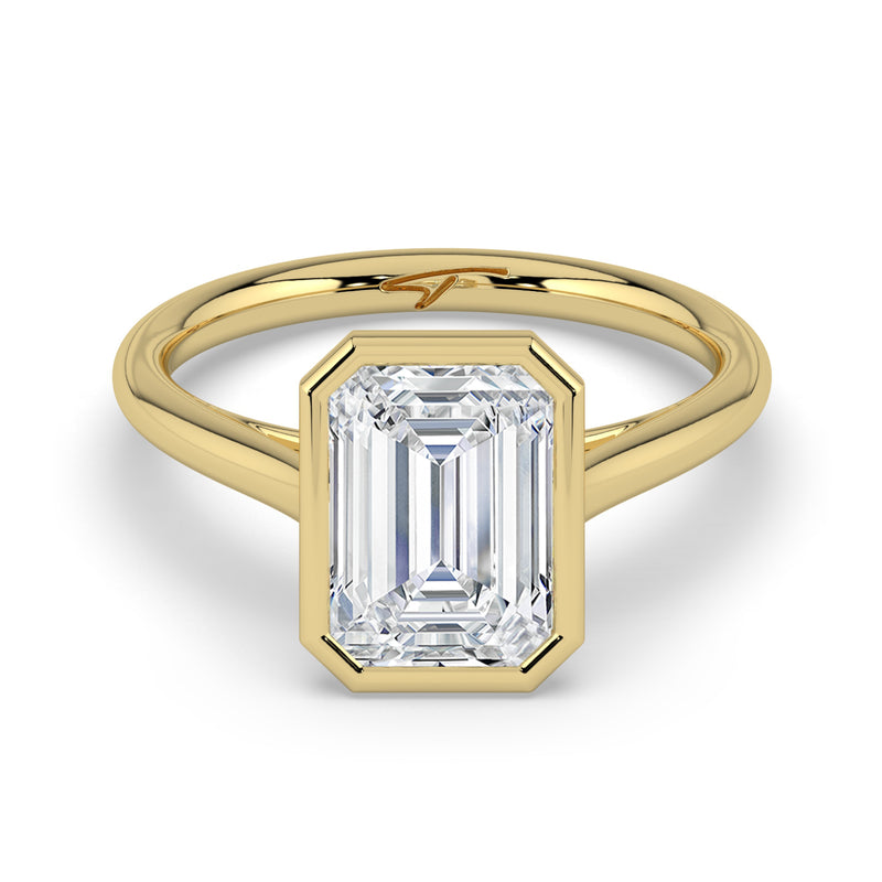 The Polaris Ring – Emerald Bezel Solitaire in 14K Yellow Gold – The Jewel Concierge