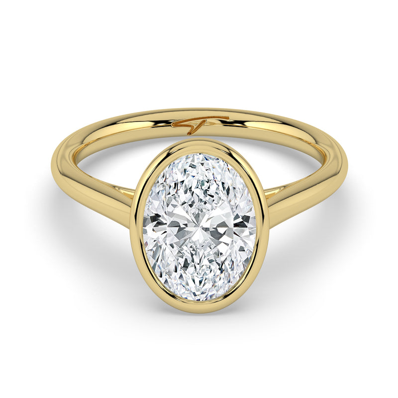 The Polaris Ring – Oval Bezel Solitaire in 14K Yellow Gold – The Jewel Concierge