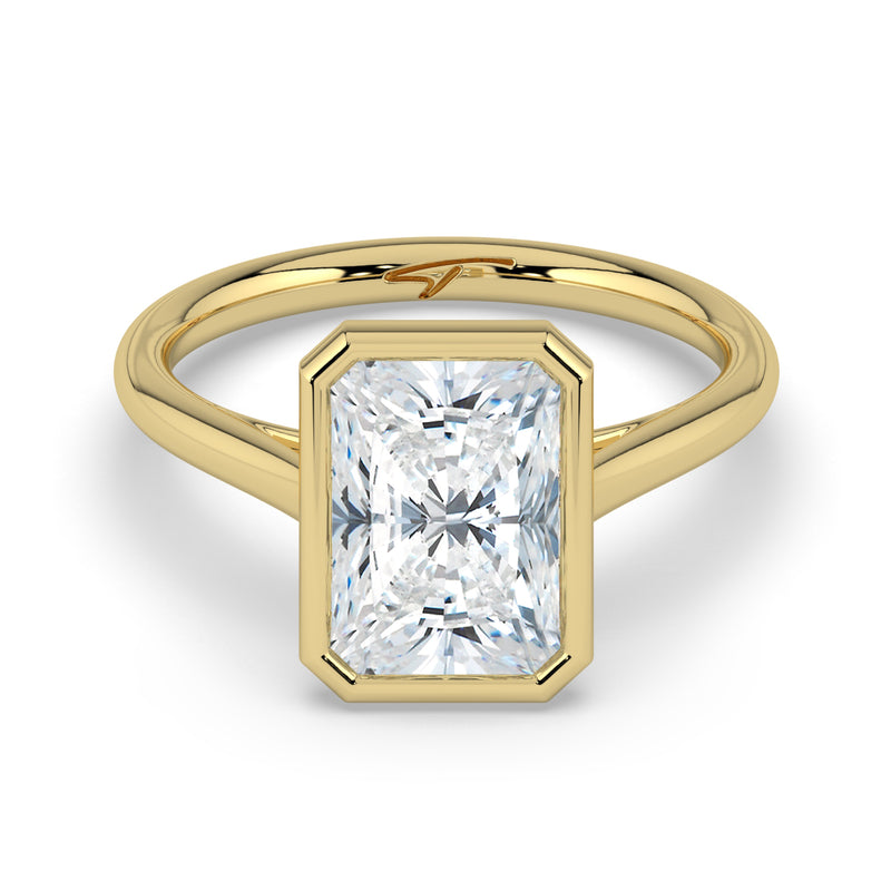The Polaris Ring – Radiant Bezel Solitaire in 14K Yellow Gold – The Jewel Concierge