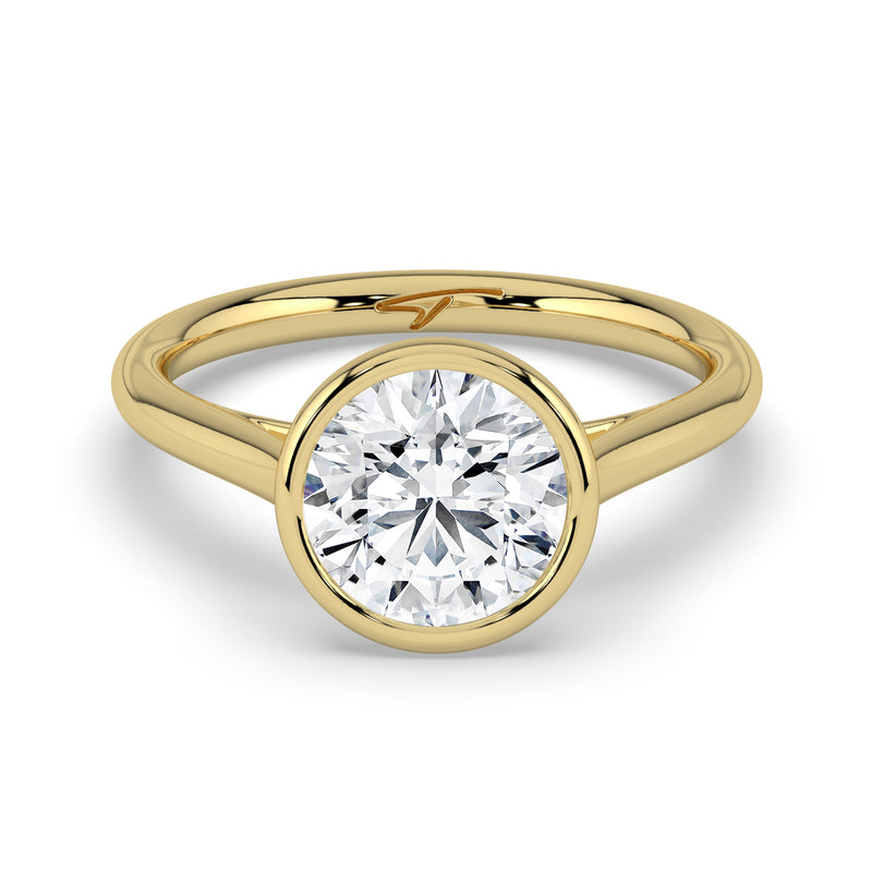 The Polaris Ring – Round Bezel Solitaire in 14K Yellow Gold – The Jewel Concierge