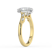 The Madeline Ring — Pear with Twisted Accent Band Lab-Grown Diamond Engagement Ring in Two-Tone Yellow and White Gold | The Jewel Concierge