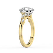 The Madeline Ring — Round with Twisted Accent Band Lab-Grown Diamond Engagement Ring in Two-Tone Yellow and White Gold | The Jewel Concierge