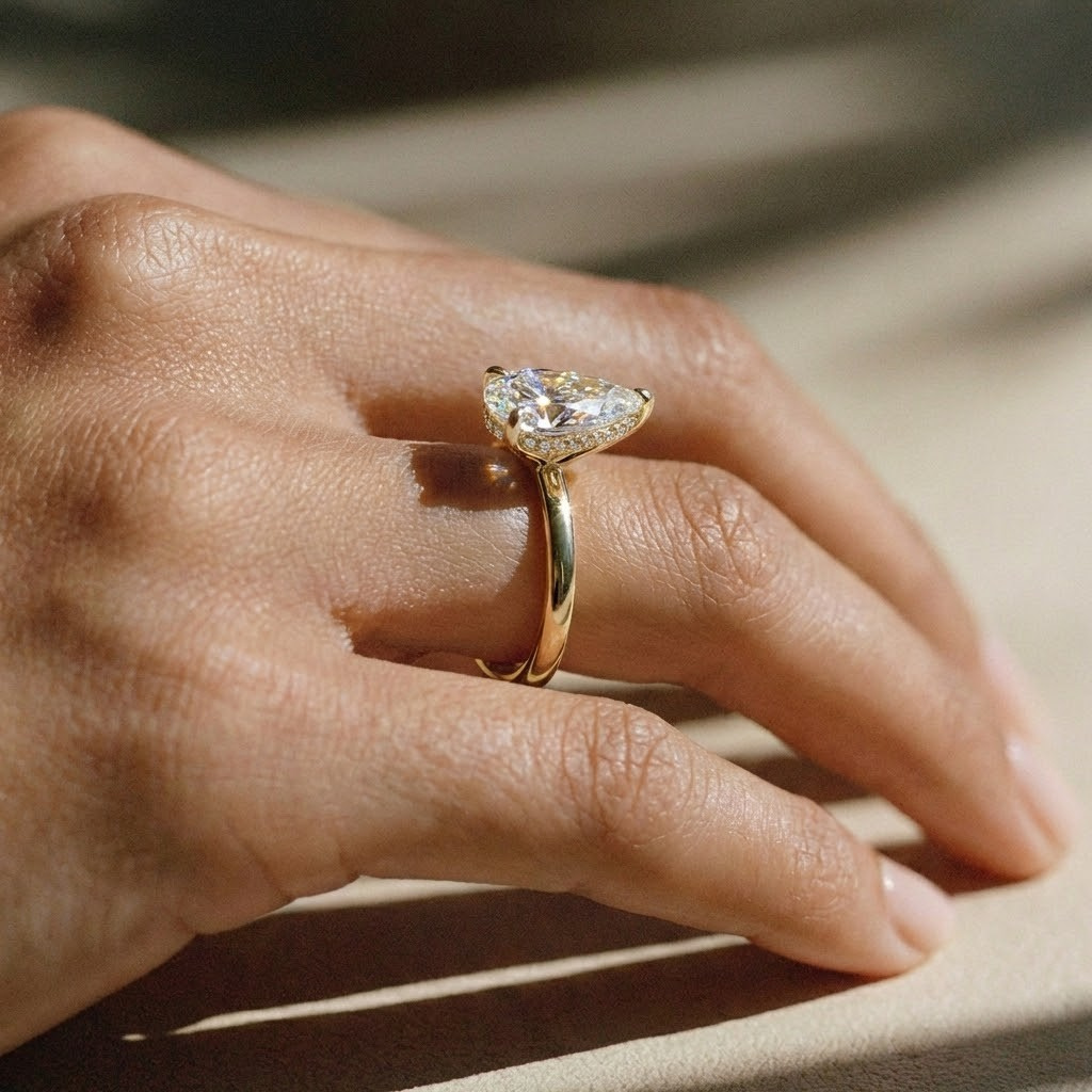 The Celeste Ring - Pear Solitaire with Hidden Halo