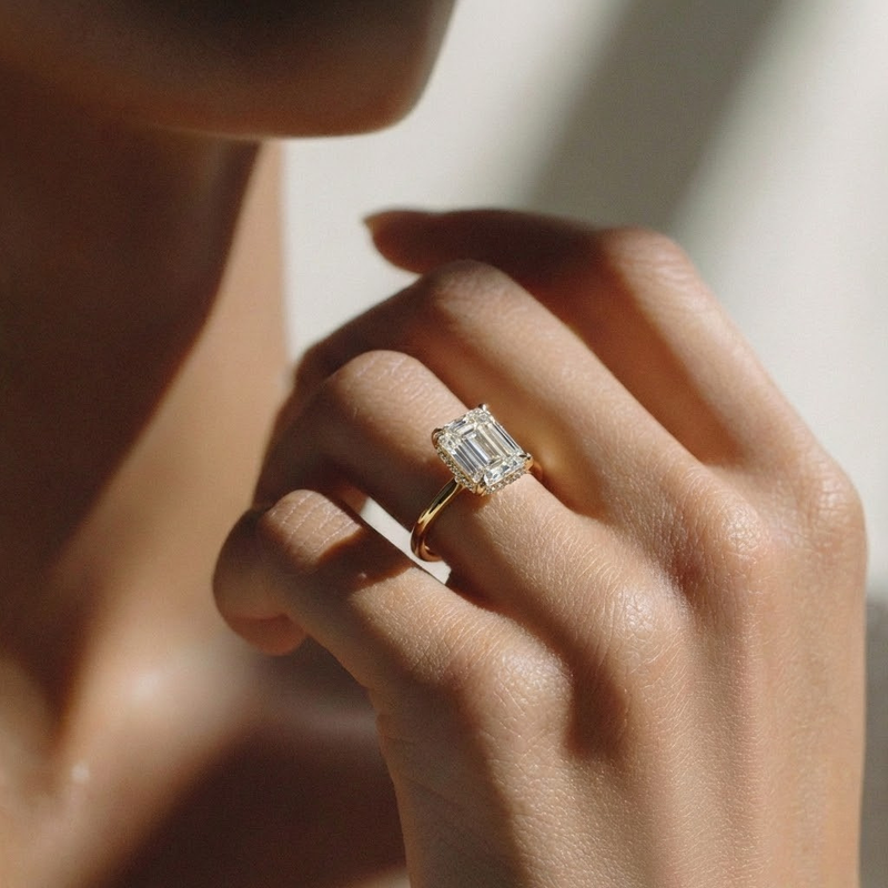 The Celeste Ring - Emerald Solitaire with Hidden Halo