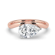 The Solis Ring — Curved Pear Solitaire Lab-Grown Diamond Engagement Ring in Two-Tone Rose and White Gold | The Jewel Concierge