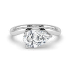 The Solis Ring - Curved Pear Solitaire