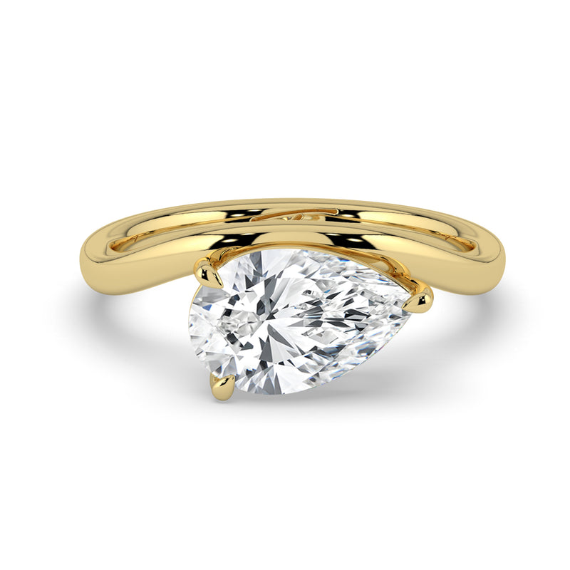 The Solis Ring – Curved Pear Solitaire in 14K Yellow Gold – The Jewel Concierge