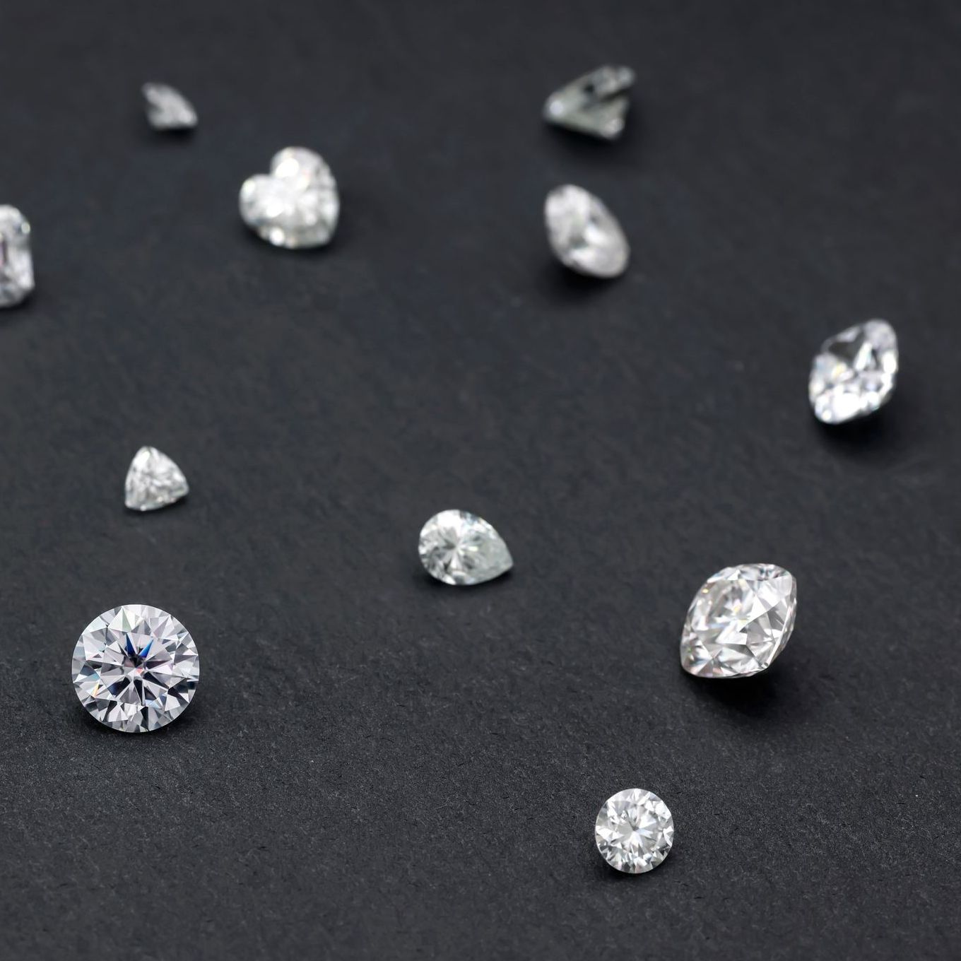 Diamonds scattered on a black velvet surface