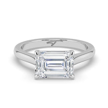 The Aria Ring - East-West Emerald Solitaire