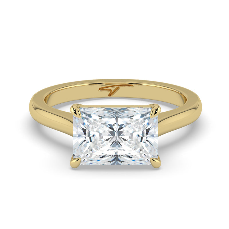 The Aria Ring – East-West Radiant Solitaire in 14K Yellow Gold – The Jewel Concierge