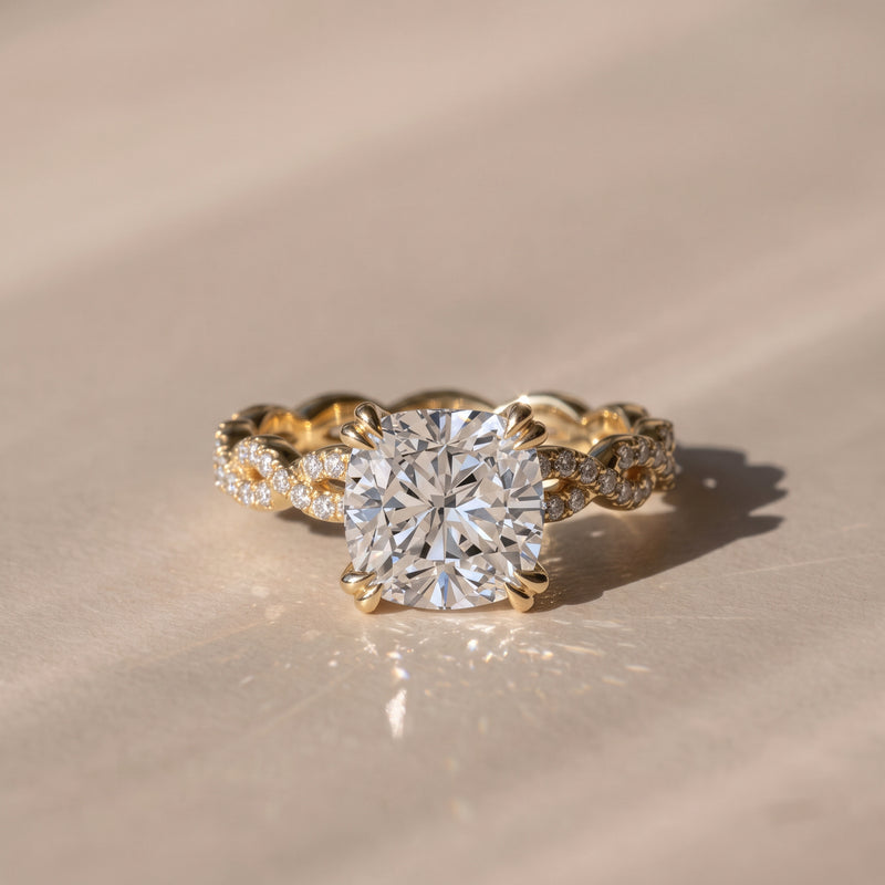 The Elysande Ring — Cushion Solitaire with Braided Pavé Band Lab-Grown Diamond Engagement Ring in Yellow Gold | The Jewel Concierge