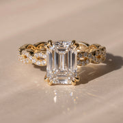 The Elysande Ring — Emerald Solitaire with Braided Pavé Band Lab-Grown Diamond Engagement Ring in Yellow Gold | The Jewel Concierge