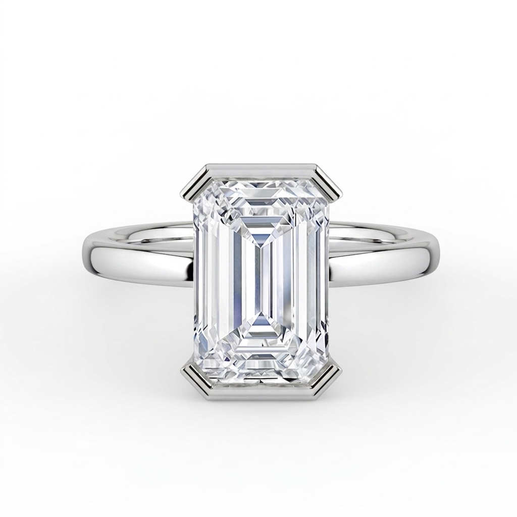 The Celine Ring – Emerald Half Bezel Solitaire in 18K WG – The Jewel Concierge