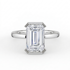 The Celine Ring – Emerald Half Bezel Solitaire in 18K WG – The Jewel Concierge