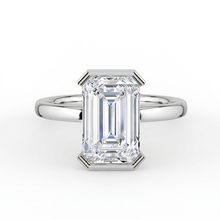 The Celine Ring – Emerald Half Bezel Solitaire in 18K WG – The Jewel Concierge