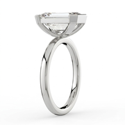 The Celine Ring – Emerald Half Bezel Solitaire in 18K White Gold – The Jewel Concierge
