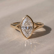 The Gabriella Ring — Marquise Bezel with Split Band Lab-Grown Diamond Engagement Ring in Yellow Gold | The Jewel Concierge