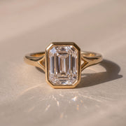 The Gabriella Ring — Emerald Bezel with Split Band Lab-Grown Diamond Engagement Ring in Yellow Gold | The Jewel Concierge