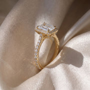 The Gemma Ring — Emerald Orbital Halo Cathedral with Pavé Band Lab-Grown Diamond Engagement Ring in Yellow Gold | The Jewel Concierge