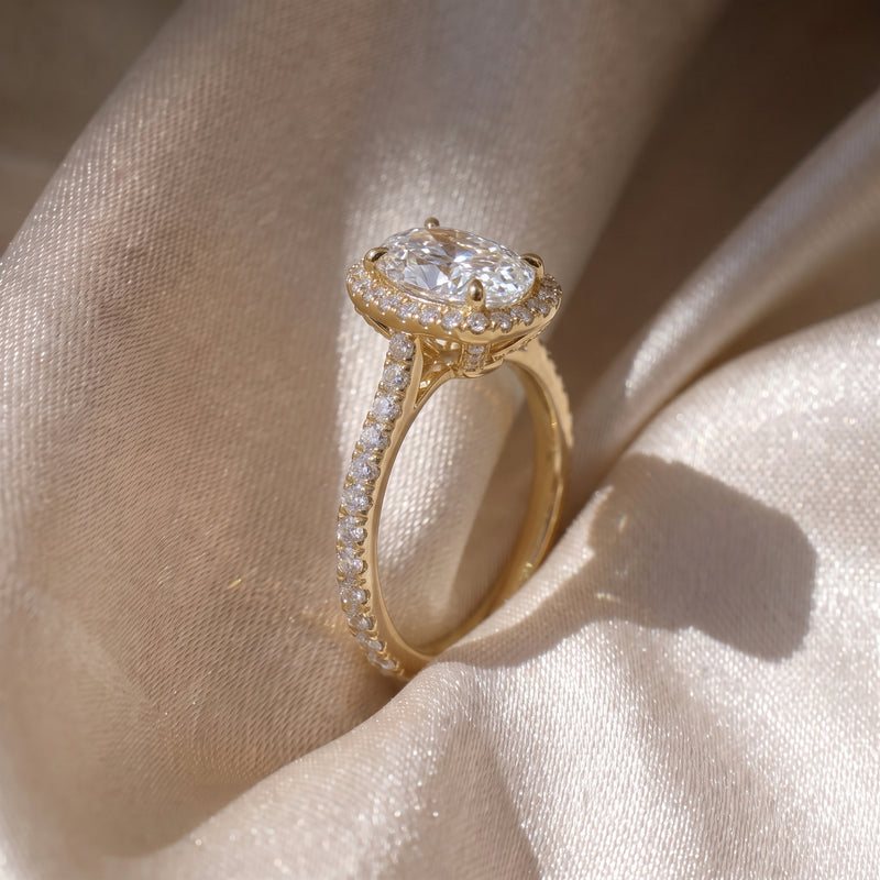 The Gemma Ring — Oval Orbital Halo Cathedral with Pavé Band Lab-Grown Diamond Engagement Ring in Yellow Gold | The Jewel Concierge
